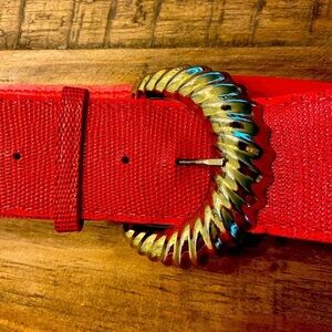 Red faux leather belt with gold tone buckle.  Make a bundle.  35.5” long